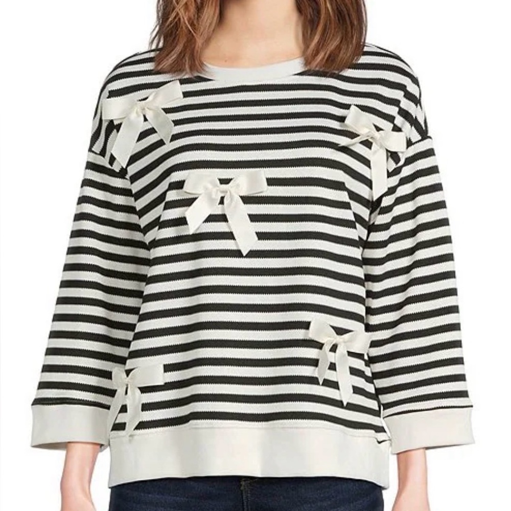Ali miles sweater w white bows. Super cute!